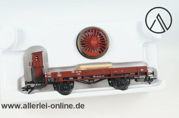 Märklin Spur H0 | 46077 Niederbordwagen mit Dampflok-Radsatz beladen | Güterwagen OVP