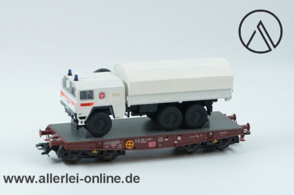 Märklin Spur H0 | 48670 Schwerlastwagen mit Johanniter MAN-LKW 7t | Flachwagen der DB in OVP