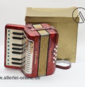 Hohner Mignon I Akkordeon | Rot / Perlrot | 17 Piano-Tasten | 8 Bässe mit Originalkarton