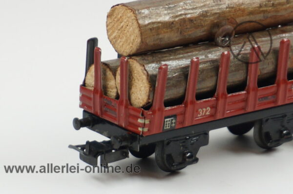 Märklin H0 | Märklin 372 Blech- Rungenwagen mit Bremserhaus | Güterwagen mit Stammholz Beladung left