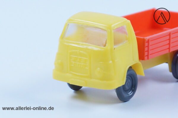 Alter MAN 415 Diesel Pritschen LKW | Arthur Hammer Lüdenscheid Groschenauto - Plastik Rollachser | Gelb-Orange