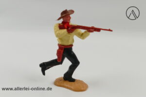 Timpo Toys | Cowboy laufend mit Gewehr | Vintage Timpo Toys Steckfigur vorn