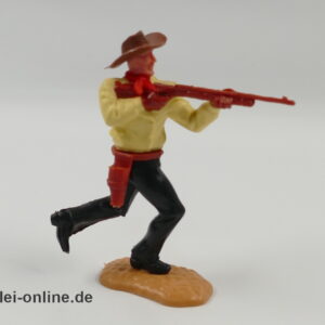 Timpo Toys | Cowboy laufend mit Gewehr | Vintage Timpo Toys Steckfigur vorn