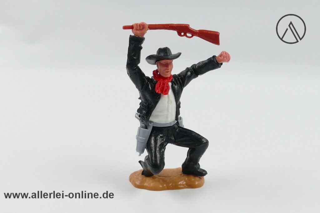 Timpo Toys | Cowboy hockend mit Gewehr | schwarz | Vintage Timpo Toys Steckfigur