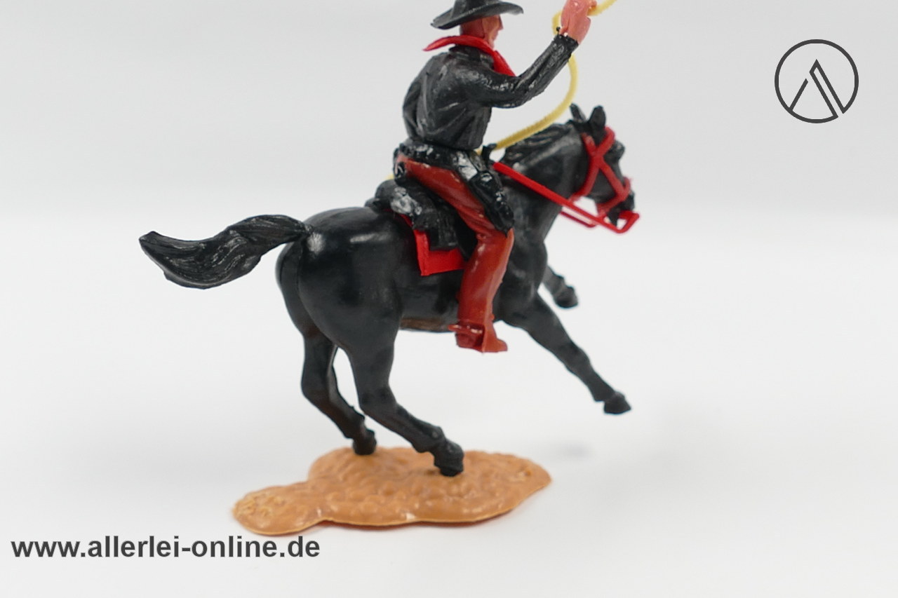 Timpo Toys | Cowboy zu Pferd mit Lasso | Vintage Timpo Toys Steckfigur hinten Timpo Toys | Cowboy zu Pferd mit Lasso | Vintage Timpo Toys Steckfigur hinten